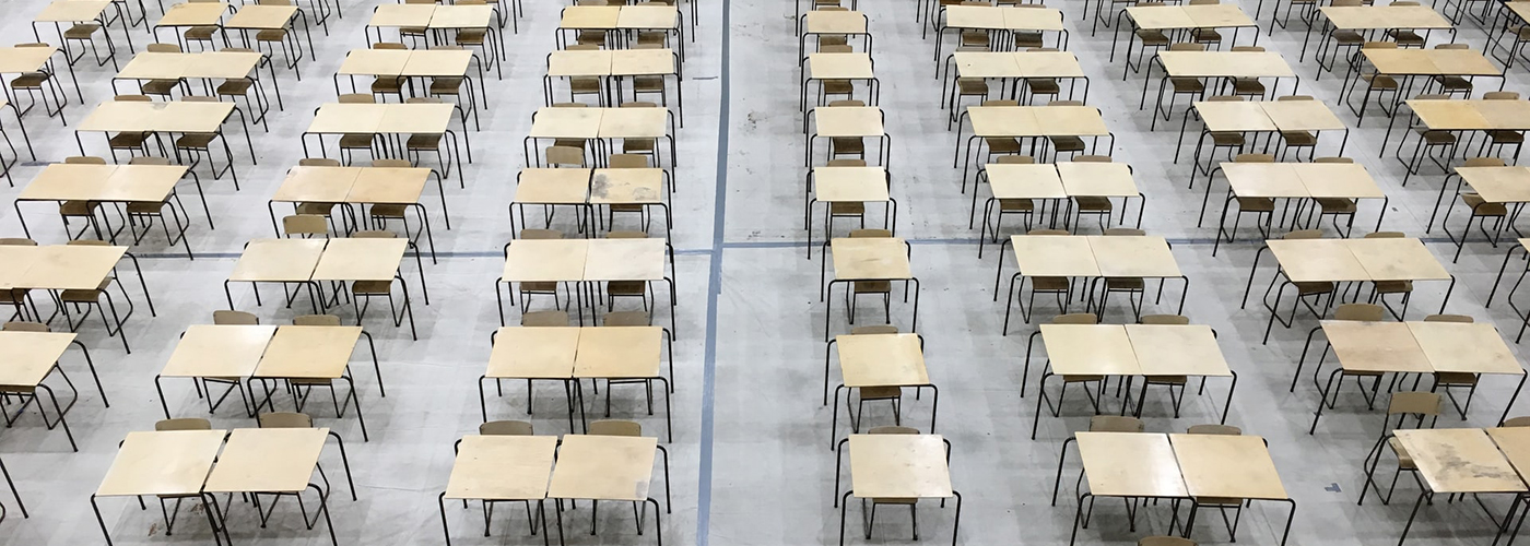 Empty desks in exams hall